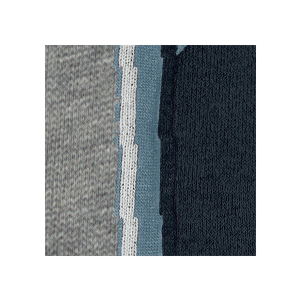 Close-up van gebreide stof met grijze, witte, lichtblauwe en donkerblauwe kleurblokken