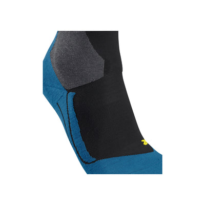 Zwarte hardloopsok met blauwe versterking en gele accentdetails, zijkant getoond