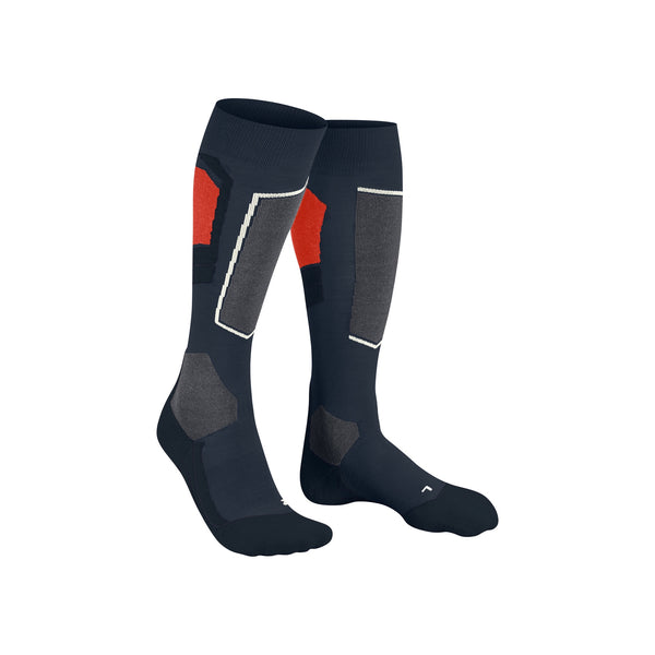 Donkerblauwe skisokken met rode en witte accenten, versterkte zones en compressie voor optimaal comfort