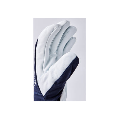 Donkerblauwe en witte beschermende handschoen met gevoerde palm, close-up zijaanzicht