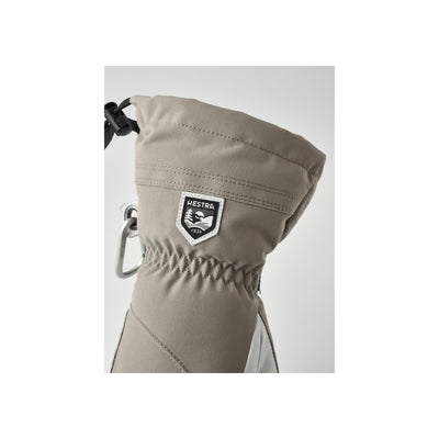 Hestra handschoen in beige met elastische pols en merklogo badge op de rug