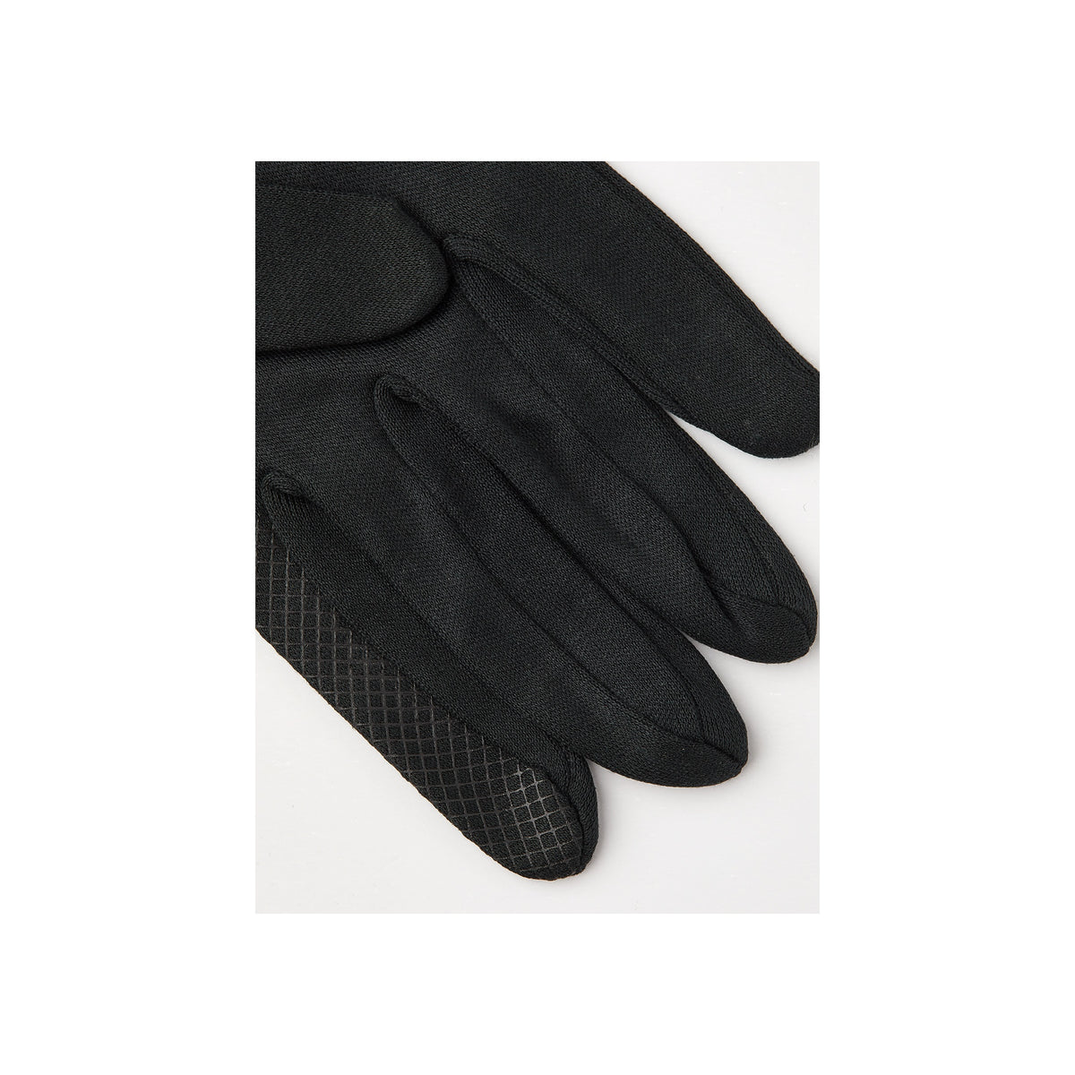 Zwarte handschoenen met gestructureerde grip op handpalm en vingers, close-up detail