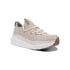 Beige gebreide sneaker met dikke witte zool en elastische veters, comfortabele sportschoen voor dames