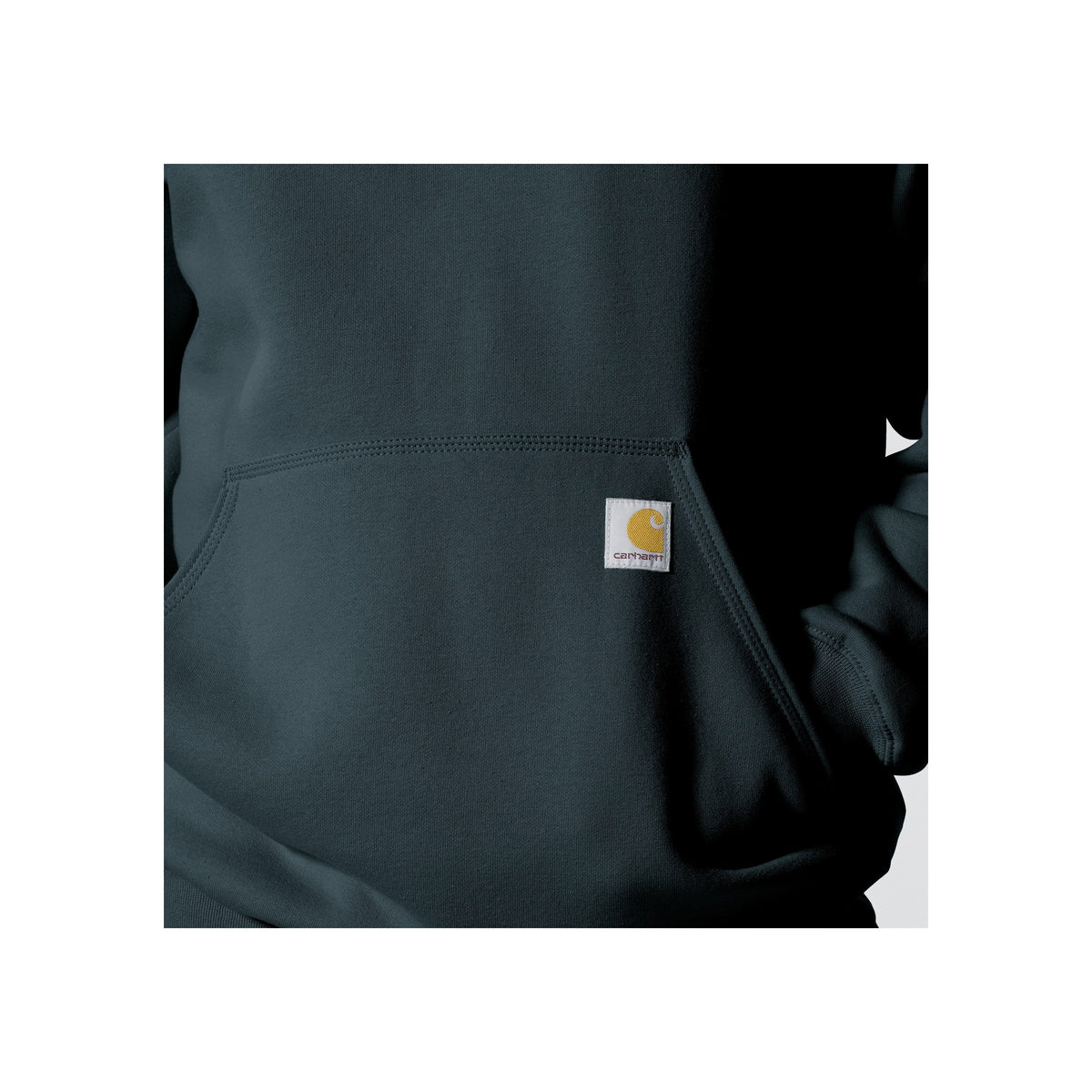 Carhartt werkbroek met zak en kenmerkend logo label op donkerblauwe stof