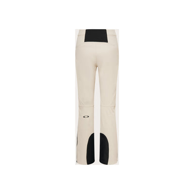 Beige dames skibroek met zwarte details en contrasterende panelen, achterkant getoond