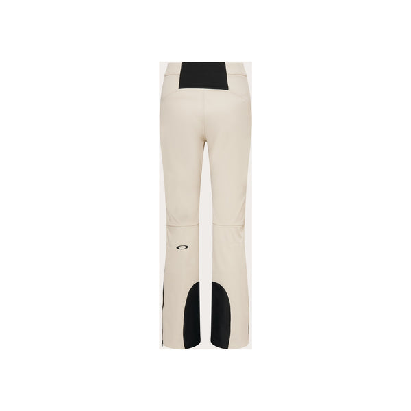 Beige dames skibroek met zwarte details en contrasterende panelen, achterkant getoond