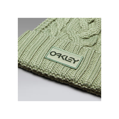 Oakley gebreide muts in lichtgroen met kabelpatroon en merklogo patch
