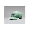 Oakley groene pet met wit ovaal logo op de voorkant, verstelbare sluiting, casual streetwear stijl