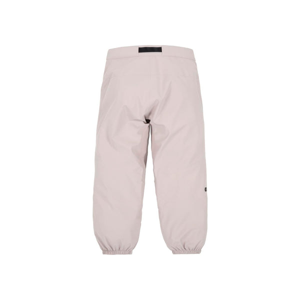 Lichtroze baby legging met knoopdetail op de knie en comfortabele pasvorm
