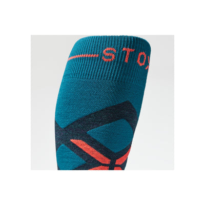 Blauwe compressiesok met rood STOX logo en steunzones voor sportprestaties