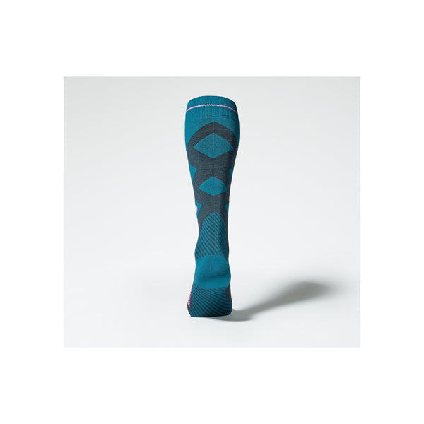 Blauwe compressiekous met anatomisch patroon en ondersteunende zones voor sportieve prestaties
