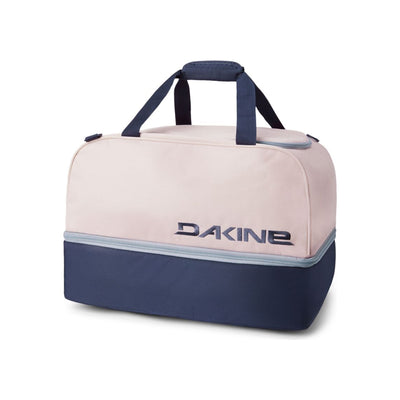 Dakine sporttas in roze en marineblauw met twee handvatten en groot logoprint